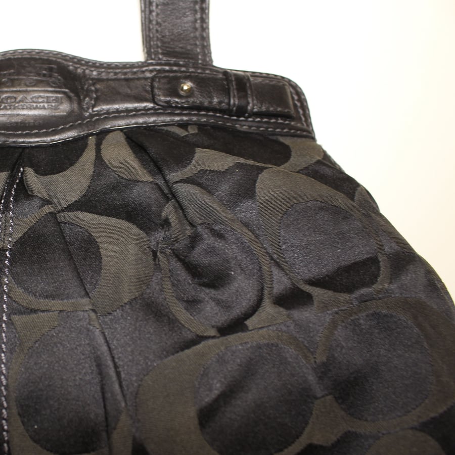 Coach Garnet black signature C canvas