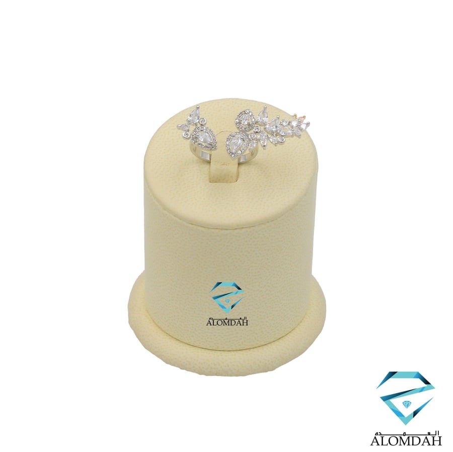 Zircon ring with diamond design