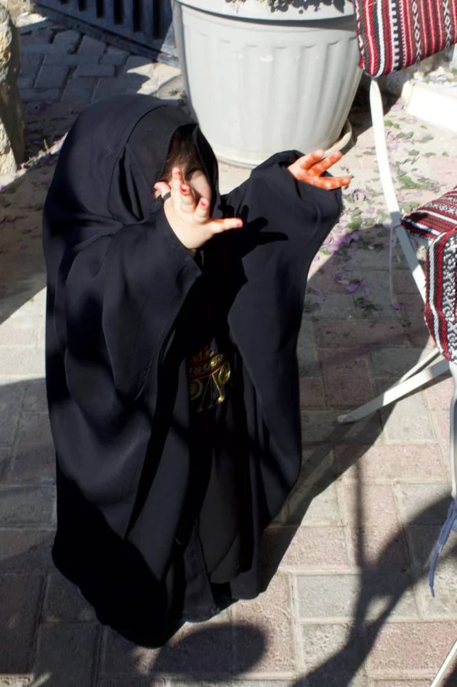 عباية أطفال.