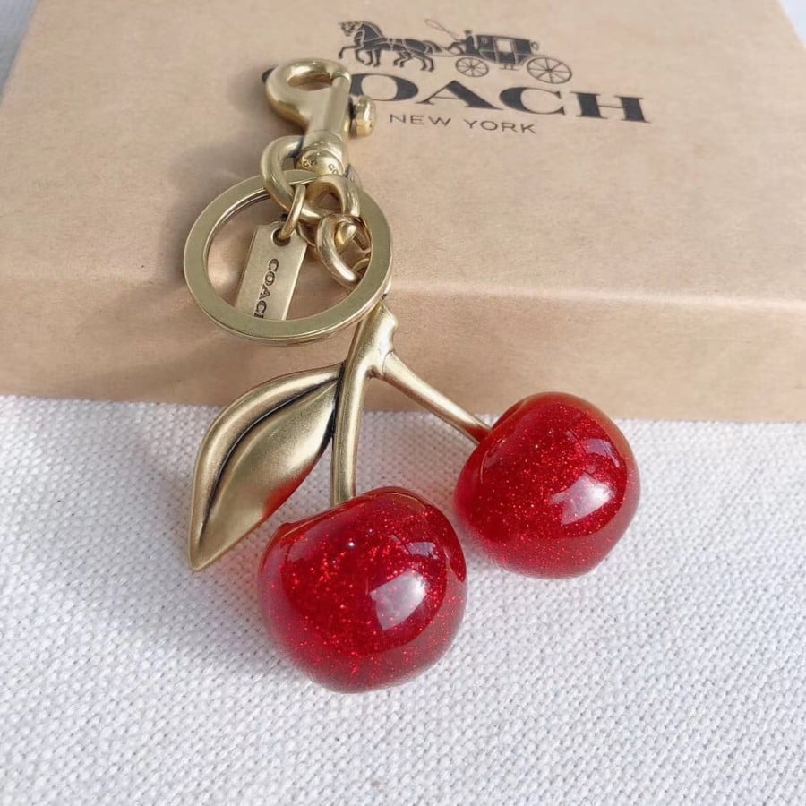 Coach cherry charm
