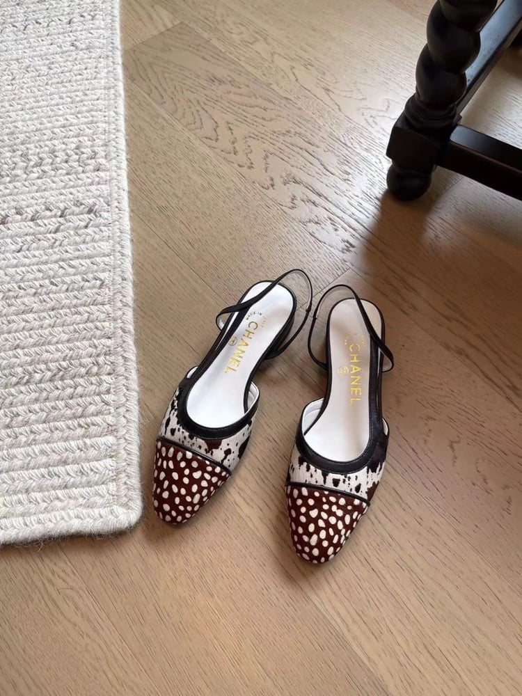 Chanel flat bottomed heeled cow-print