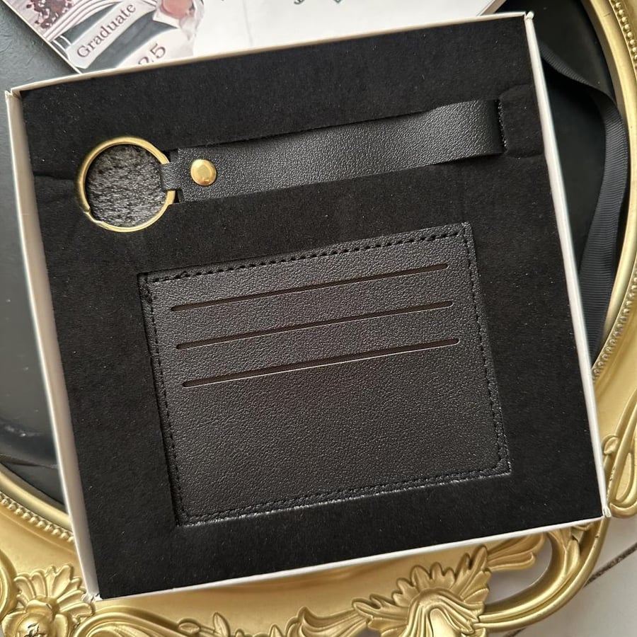 Wallet and medal