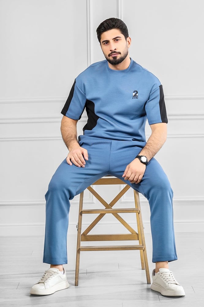 Men's oversized set, half sleeve, long pants, T-shirt decorated with embroidery in a different color, with a small-sized print of the Tornz brand.