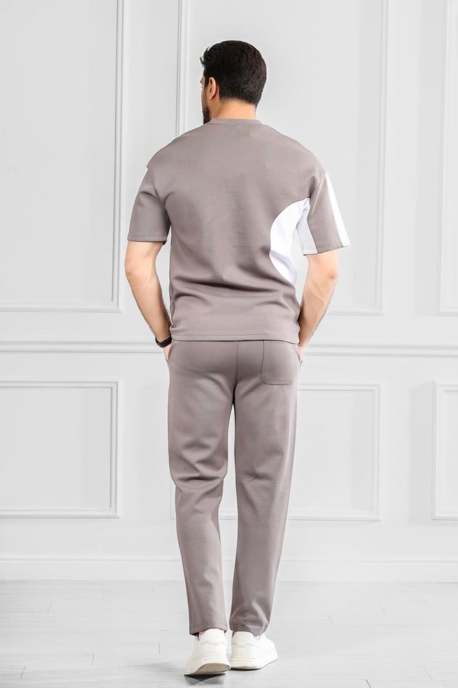 Men's oversized set, half sleeve, long pants, T-shirt decorated with embroidery in a different color, with a small-sized print of the Tornz brand.