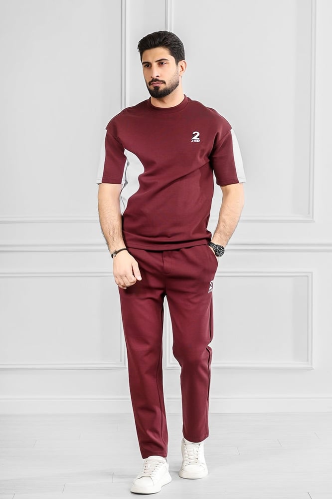 Men's oversized set, half sleeve, long pants, T-shirt decorated with embroidery in a different color, with a small-sized print of the Tornz brand.