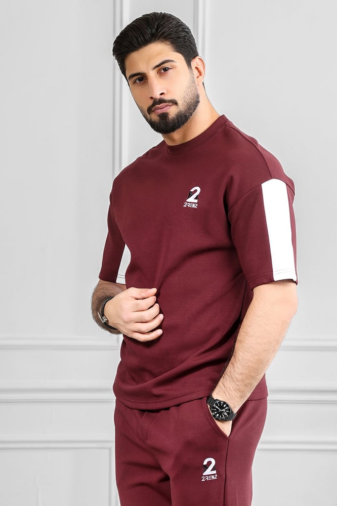 Men's oversized set, half sleeve, long pants, T-shirt decorated with embroidery in a different color, with a small-sized print of the Tornz brand.