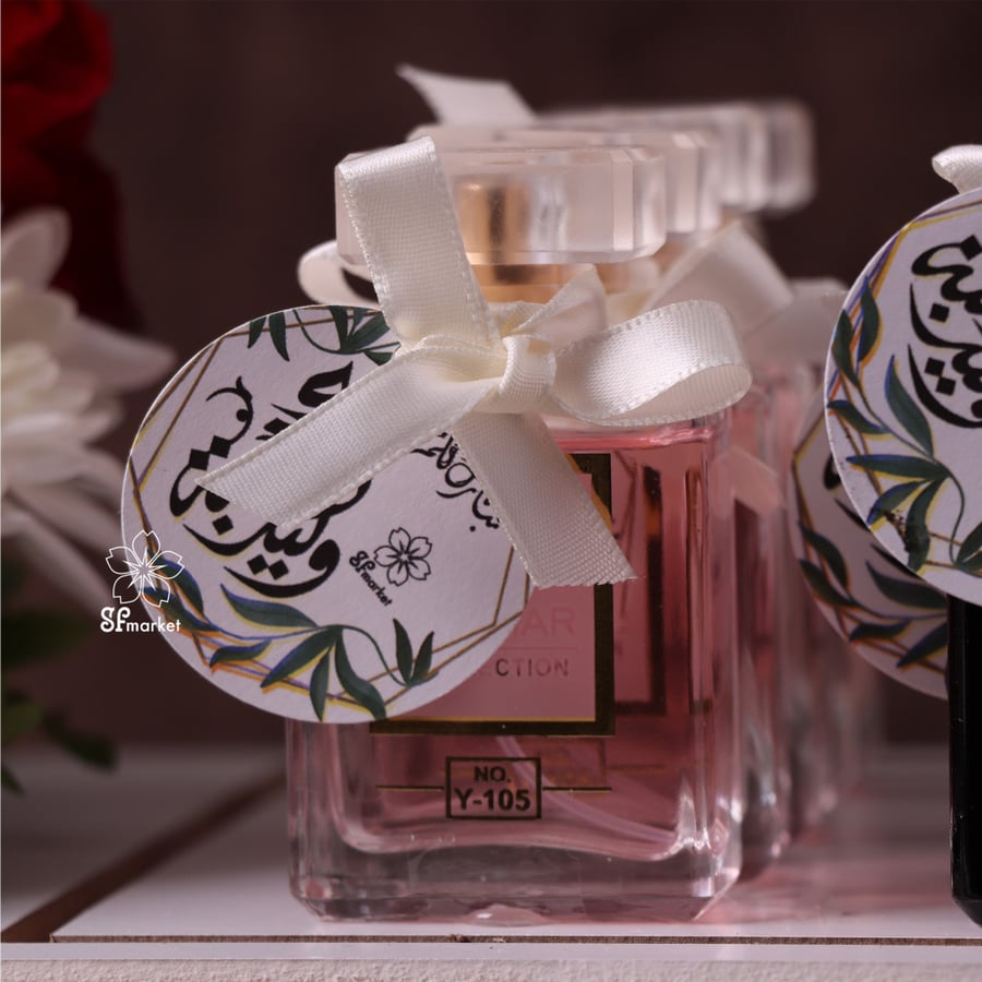 توزيعات 8 عطر ميني مع ورد طبيعي وثيم وليد الكعبة