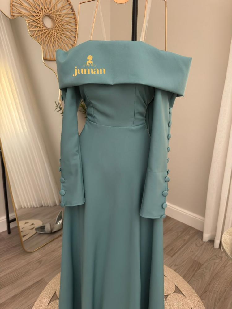 Turquoise dress with dropped sleeves