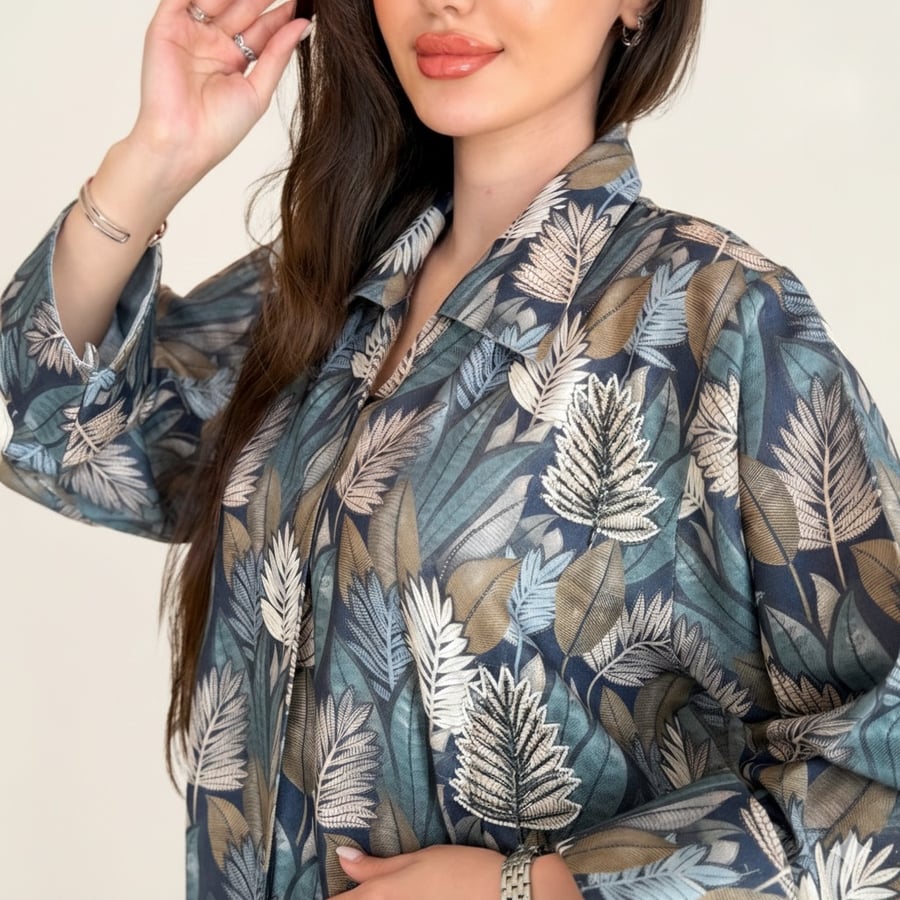 Blue cotton galabeya with floral pattern and embroidery