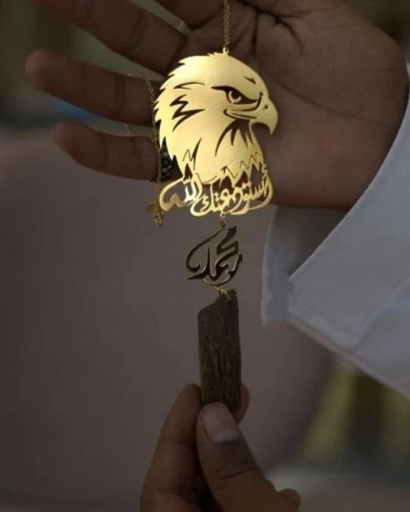 The falcon pendant with the name
