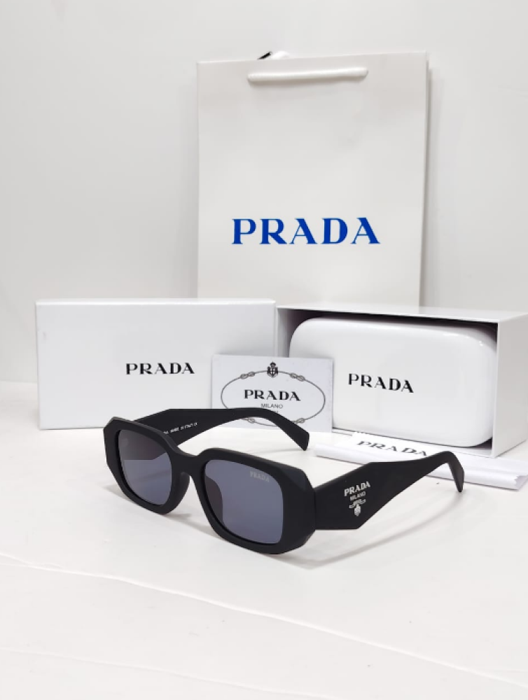 Prada women's sunglasses - elegant black frame with dark lenses 30