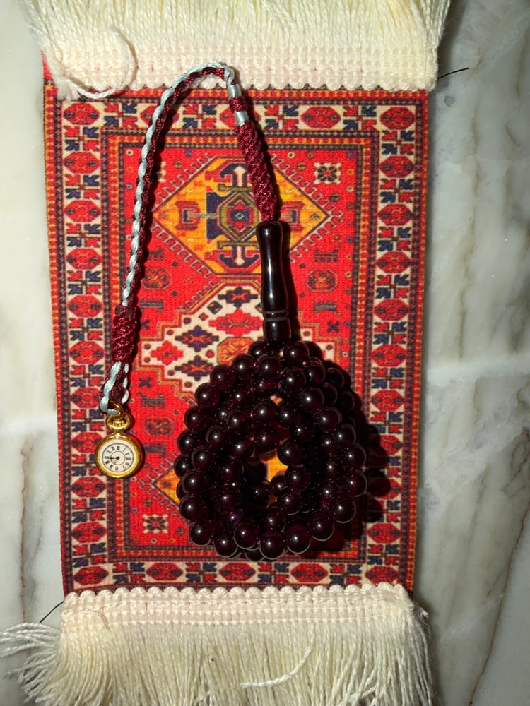 سبحة الساعة المطلووبة (عنابي)