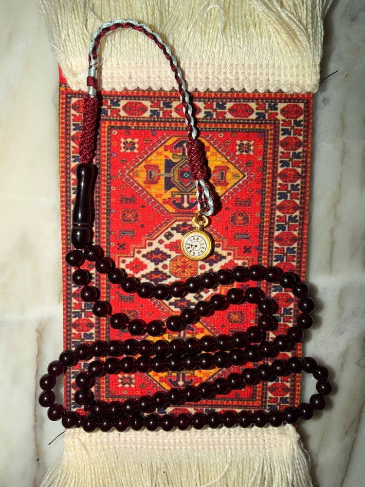 سبحة الساعة المطلووبة (عنابي)