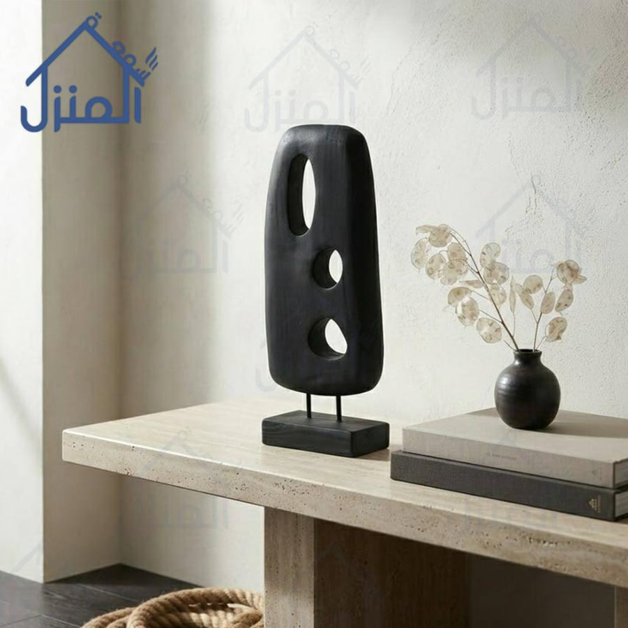 تحفة ديكور نحت تجريدي أسود بتصميم مستطيل مجوف وقاعدة عرض أنيقة