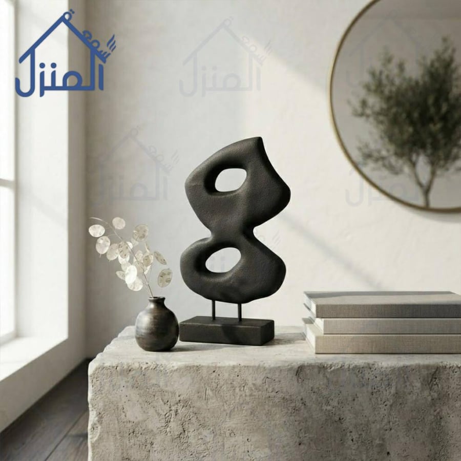 تحفة فنية سوداء بتصميم تجريدي فاخر وقاعدة أنيقة