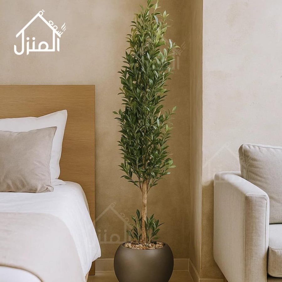 شجرة الزيتون صناعية بمركن أسود بأوراق خضراء كثيفة وتصميم طويل أنيق