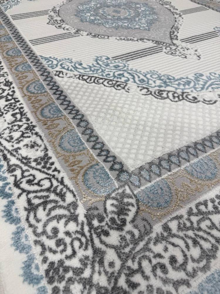 سجاد بميدالية ماسية وزخارف شرقية بدرجات الأزرق والرمادي والكريمي