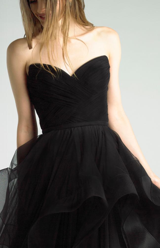 A dress made of tulle fabric, with an open chest and shoulders