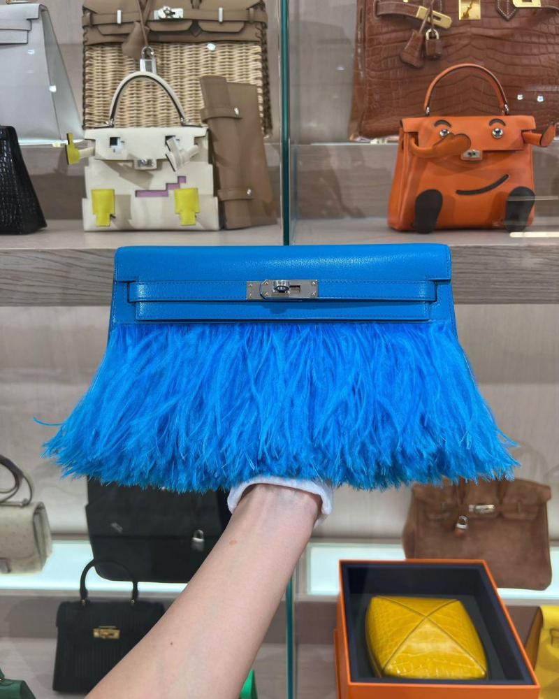 Kelly elan feathers 27cm chevre leather .