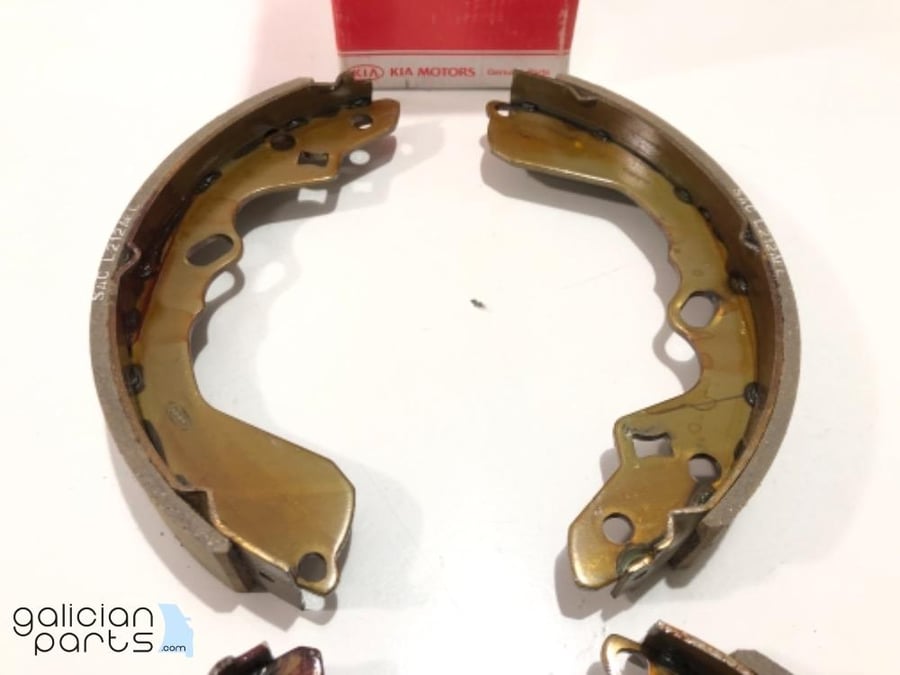 SHOE SET-REAR  - 0K2FA2638Z - طقم بطانات المكابح الخلفية
