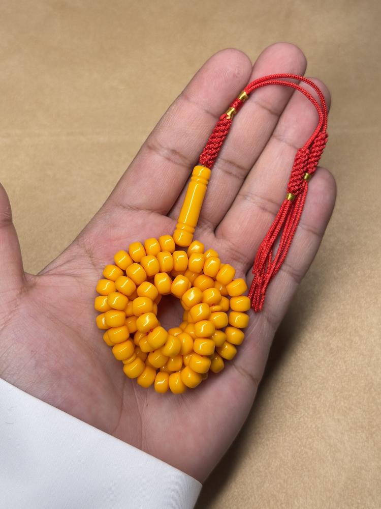 Buckle prayer bead (similar to Sandalus)