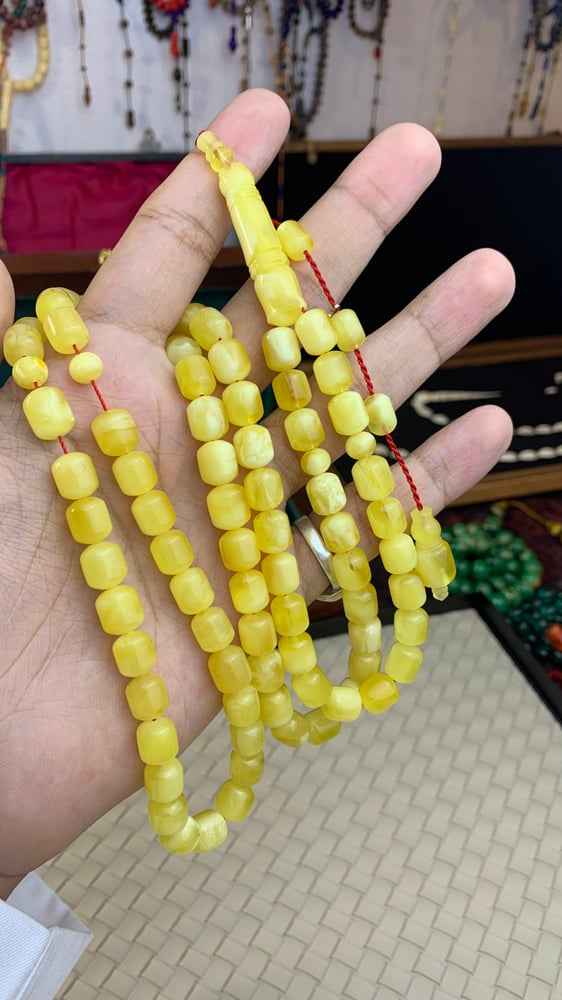 سبحة كهرمان حر حجر واحد