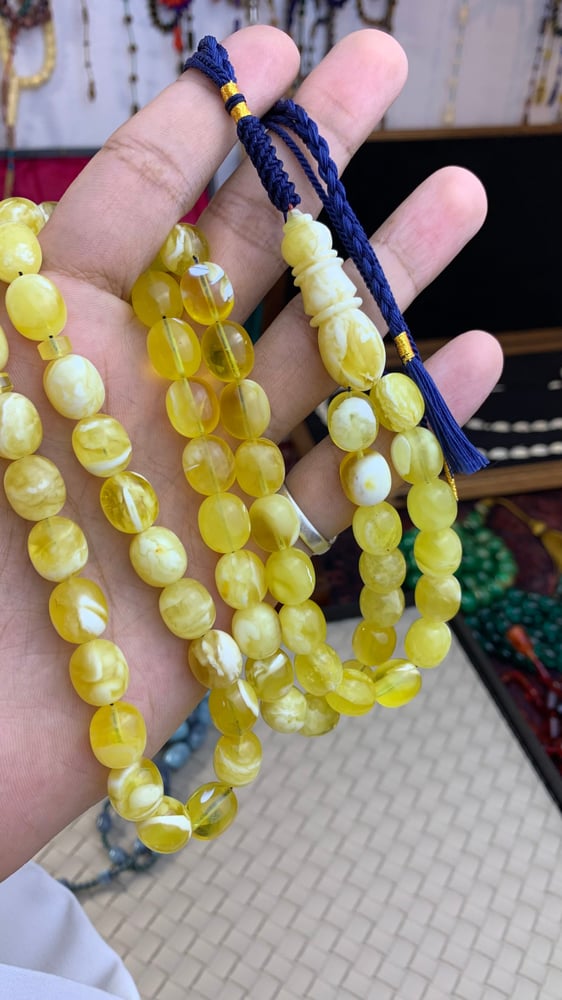 سبحة كهرمان حر ملطخ
