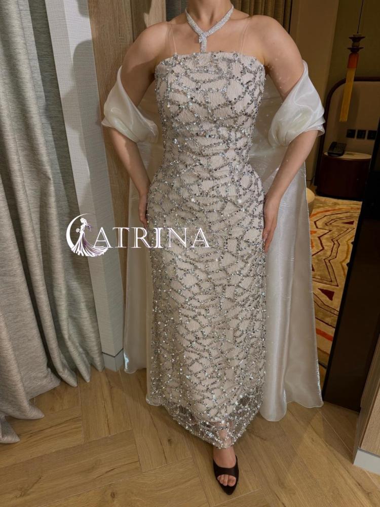 Luxury evening dress with crystal embroidery and elegant flowing cape