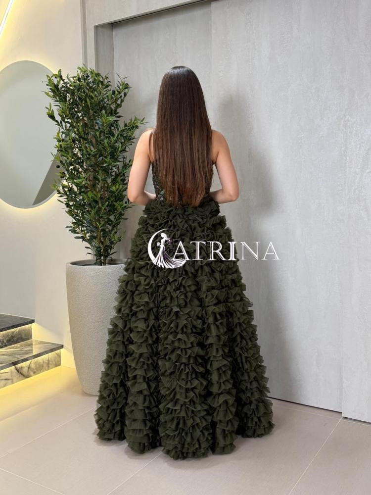 Luxury evening dress in olive color with a corset design and ruffled skirt