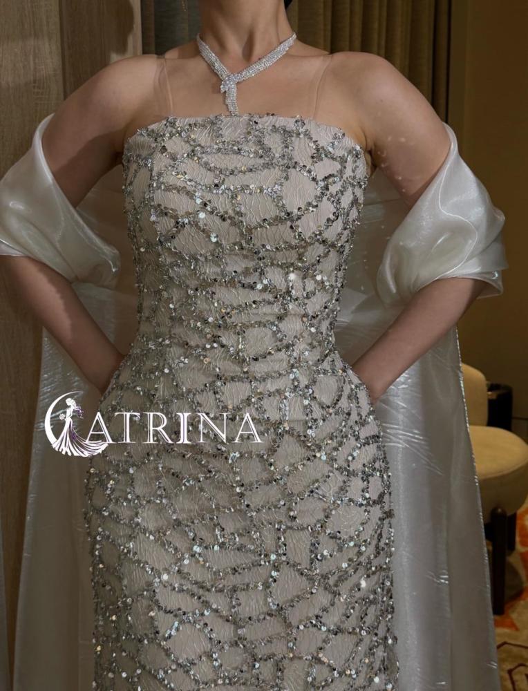 Luxury evening dress with crystal embroidery and elegant flowing cape