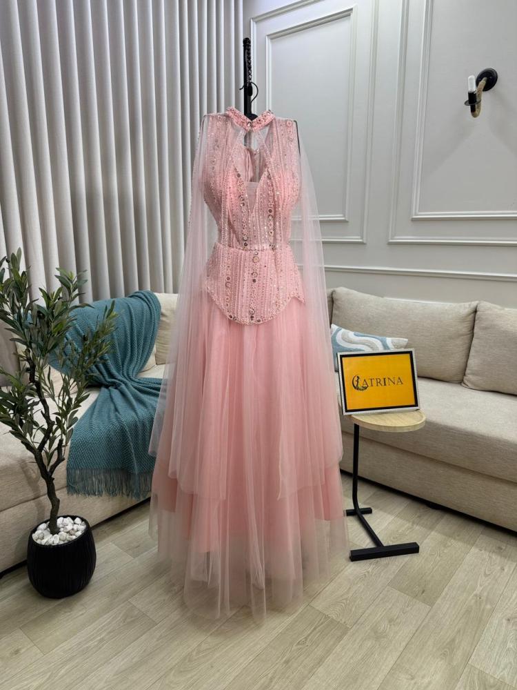 Pink tulle evening gown with a flared design
