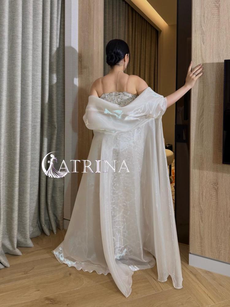 Luxury evening dress with crystal embroidery and elegant flowing cape