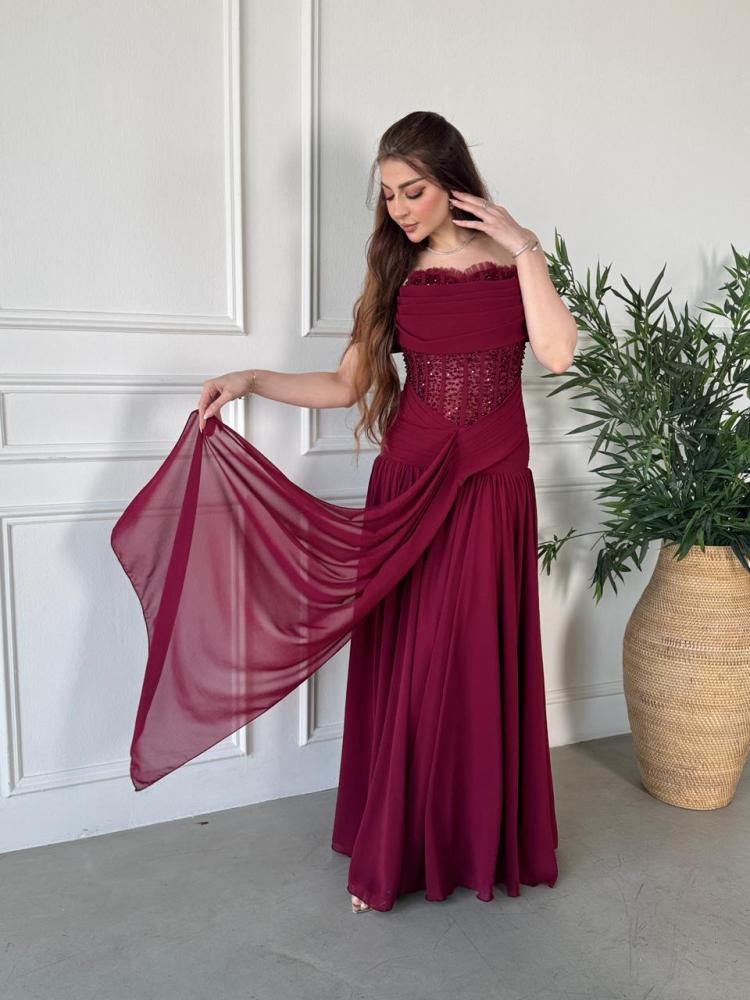 Evening dress with embroidered corset and wide skirt