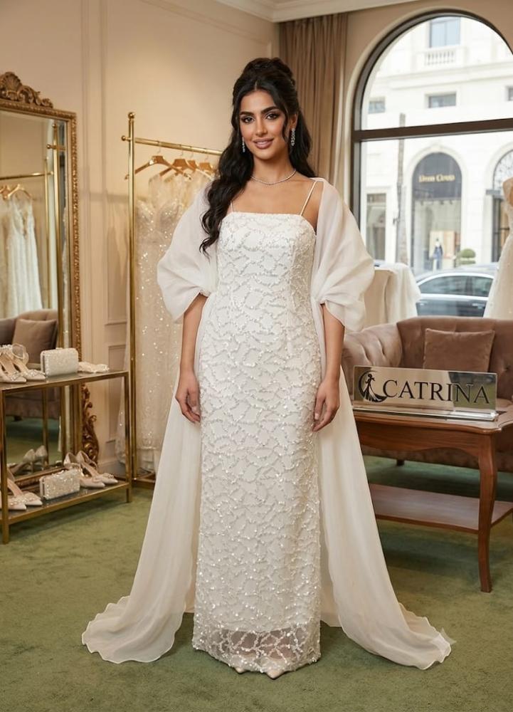 Luxury evening dress with crystal embroidery and elegant flowing cape