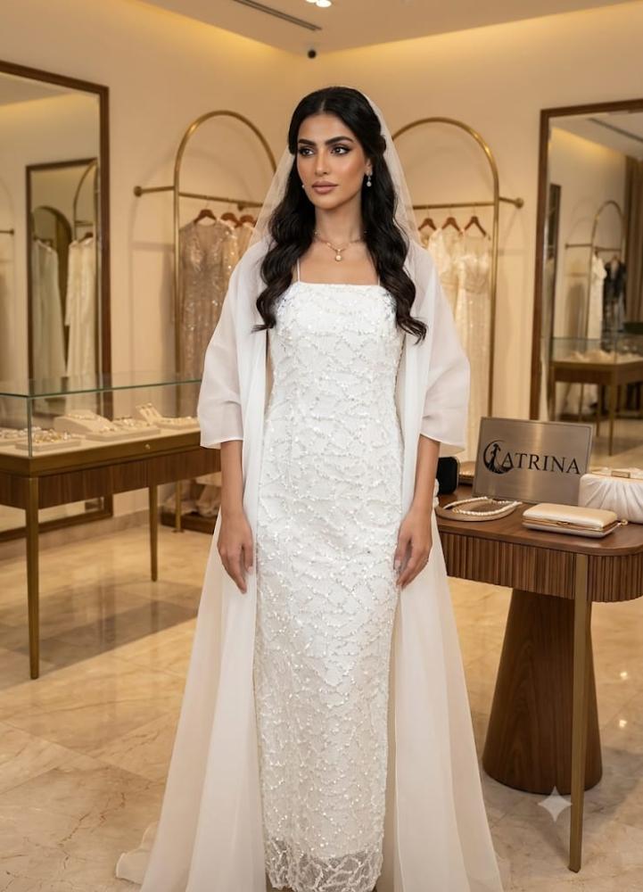 Luxury evening dress with crystal embroidery and elegant flowing cape