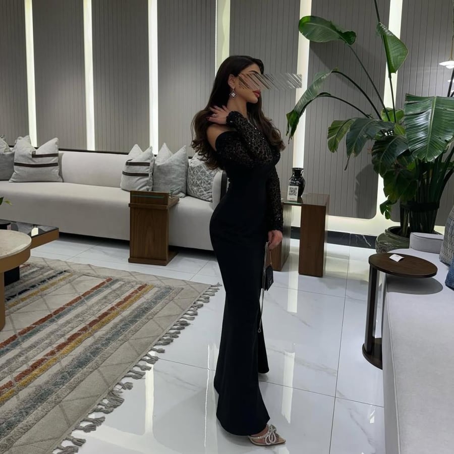 فستان اسود سهرة ناعم بكلفه ترتر وفصوص