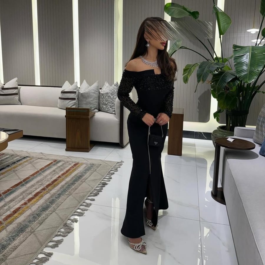فستان اسود سهرة ناعم بكلفه ترتر وفصوص