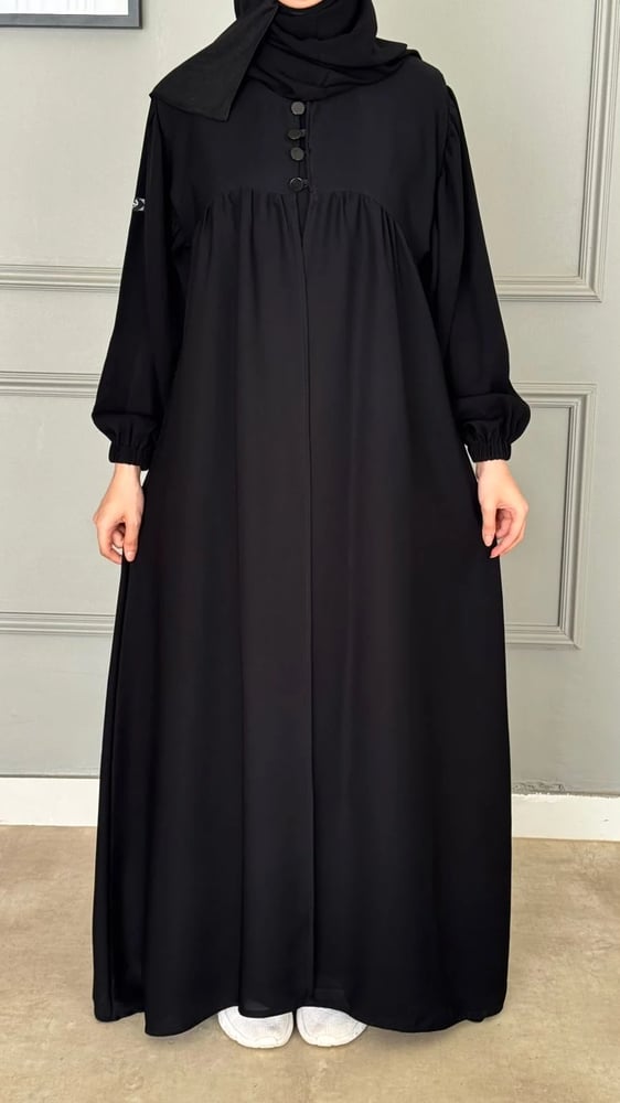 عباية مع فستان داخلي