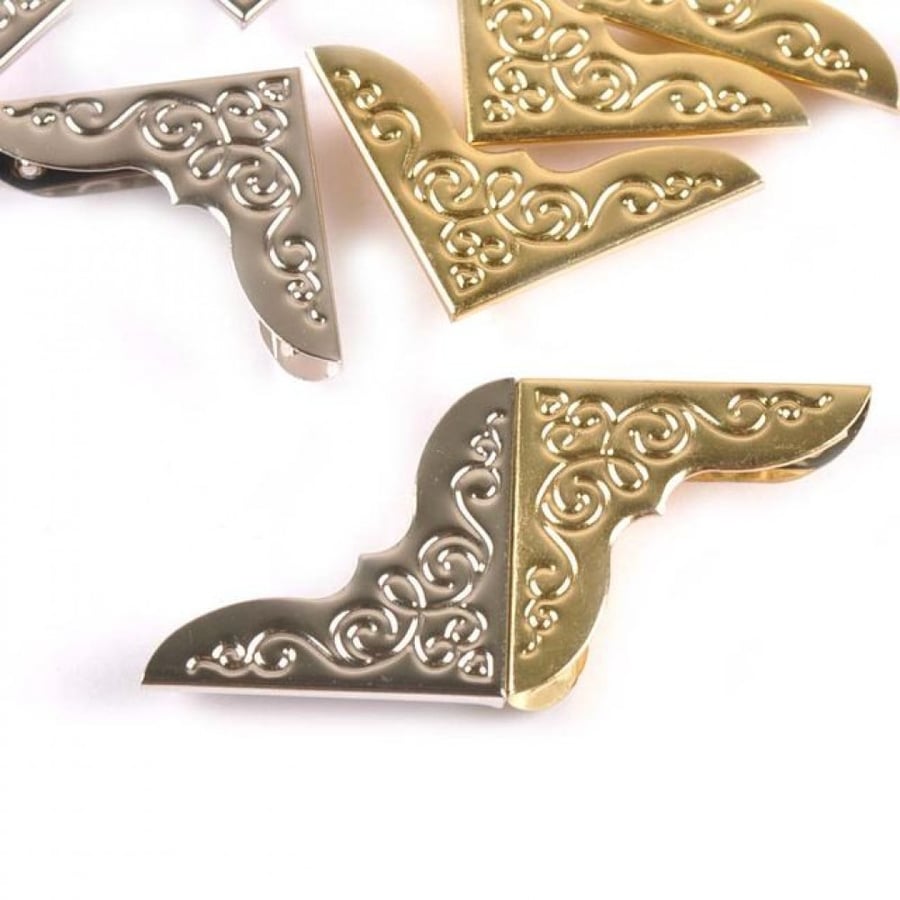 اركان معدنيه للمصاحف والكتب حجم وسط 3سم × 2سم