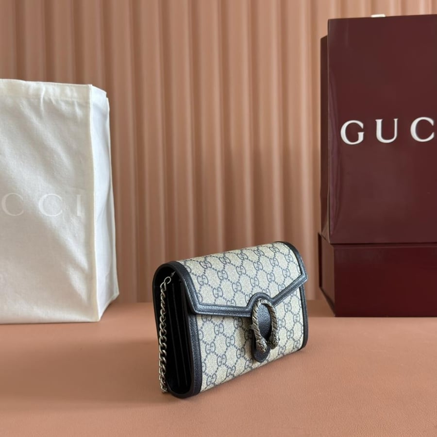 حقيبة غوتشي صغيرة من الجلد الأصلي GG