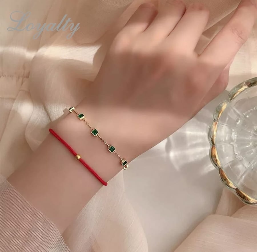 اسورة فضه عيار 925 مطلي مرصعه بحجر الزمورد الاخضر