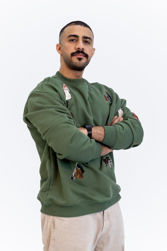 سويتر حياة السراج