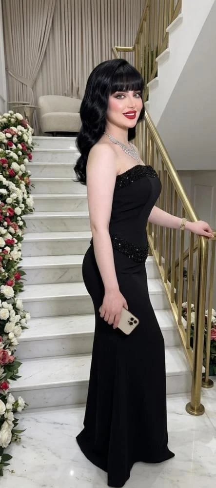 فستان سهرة أسود ملكي بقصة ميرميد وتطريز فاخر
