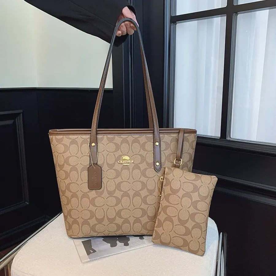 شنطة coach