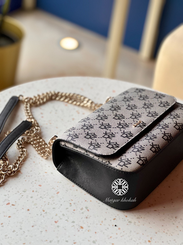 Darkini black bag with logo, shoulder and crossbody wear