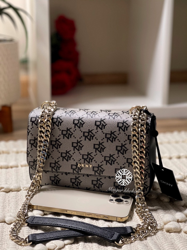 Darkini black bag with logo, shoulder and crossbody wear