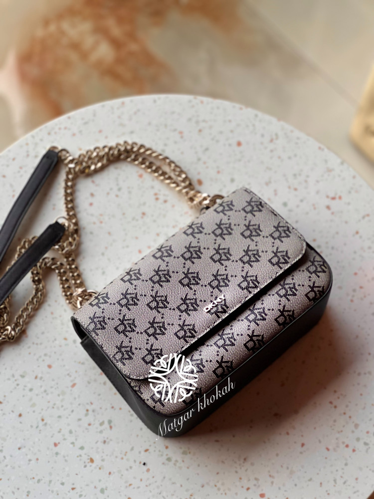 Darkini black bag with logo, shoulder and crossbody wear