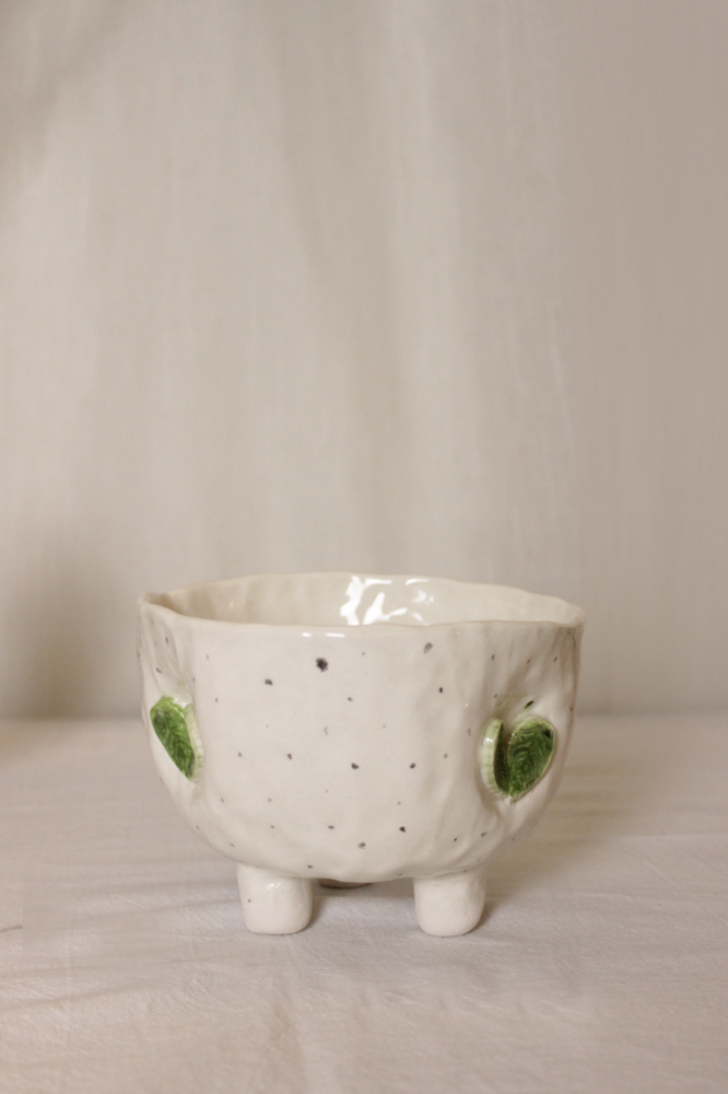 Boots in a handmade craft container
