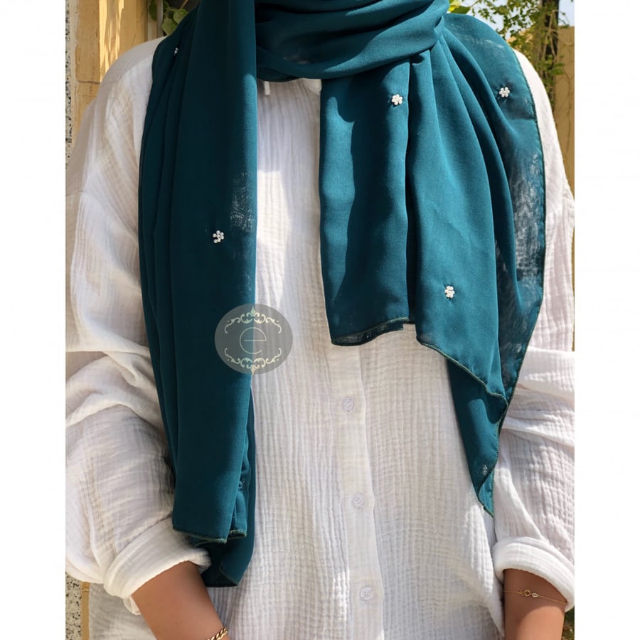 Blue-colored Bawal headscarf with pearls along the length of the headscarf