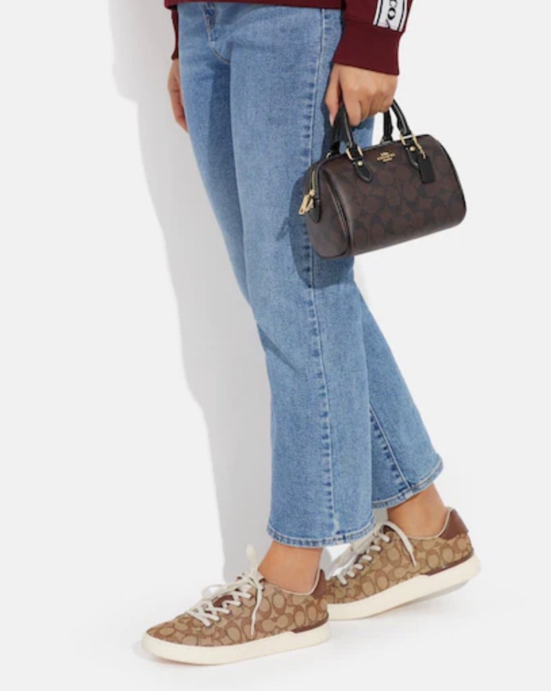كوتش | Mini Rowan Crossbody in signature canvas